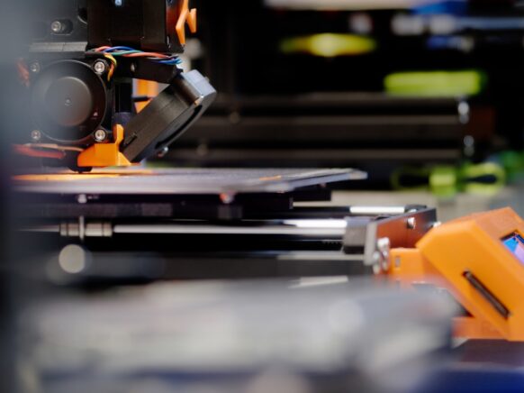 A close up of a machine that is cutting something